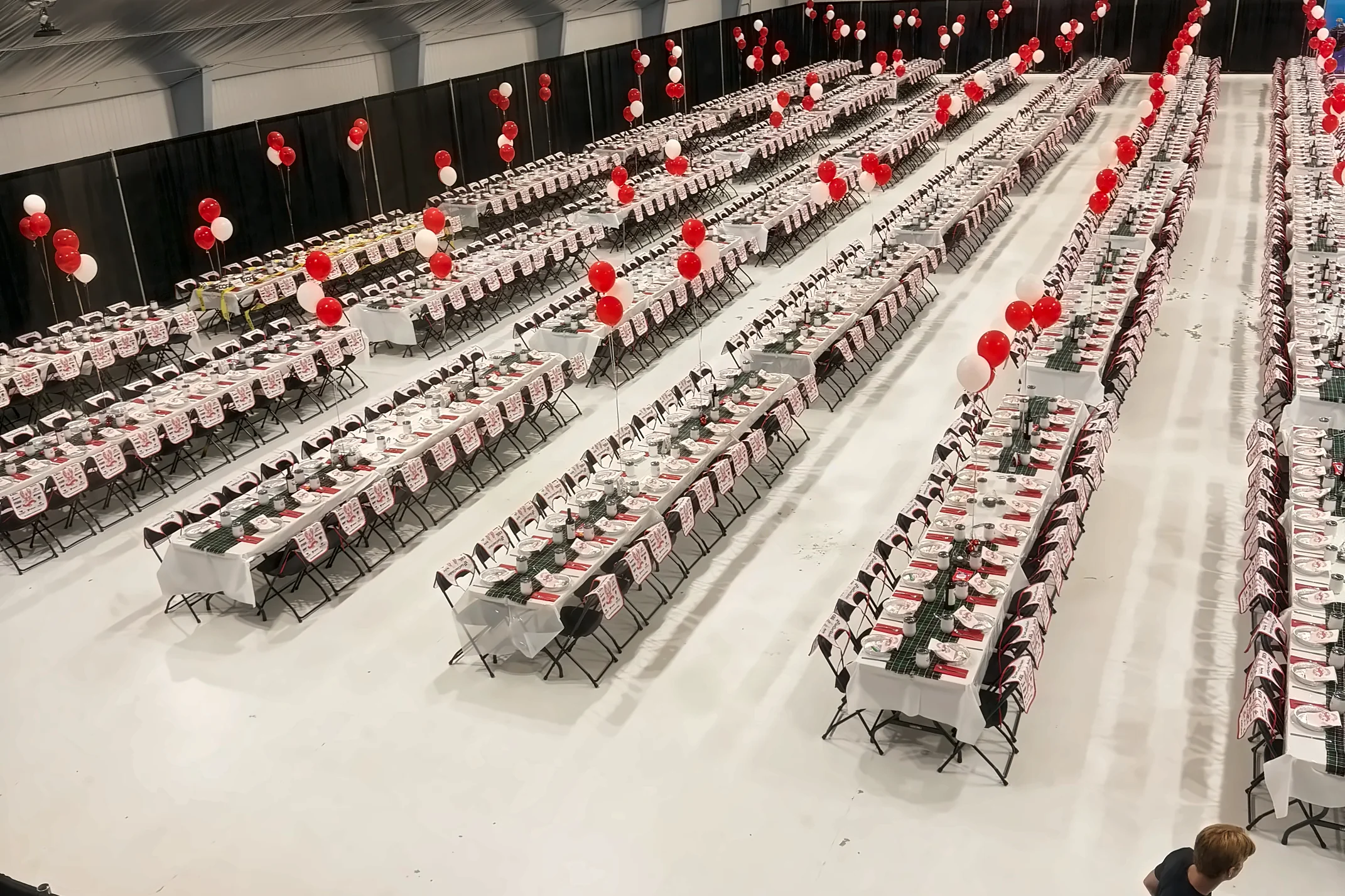 Banquet hall set with long dinner tables for hundreds of guests, catered by Fireside Catering in the St. John's area, Newfoundland