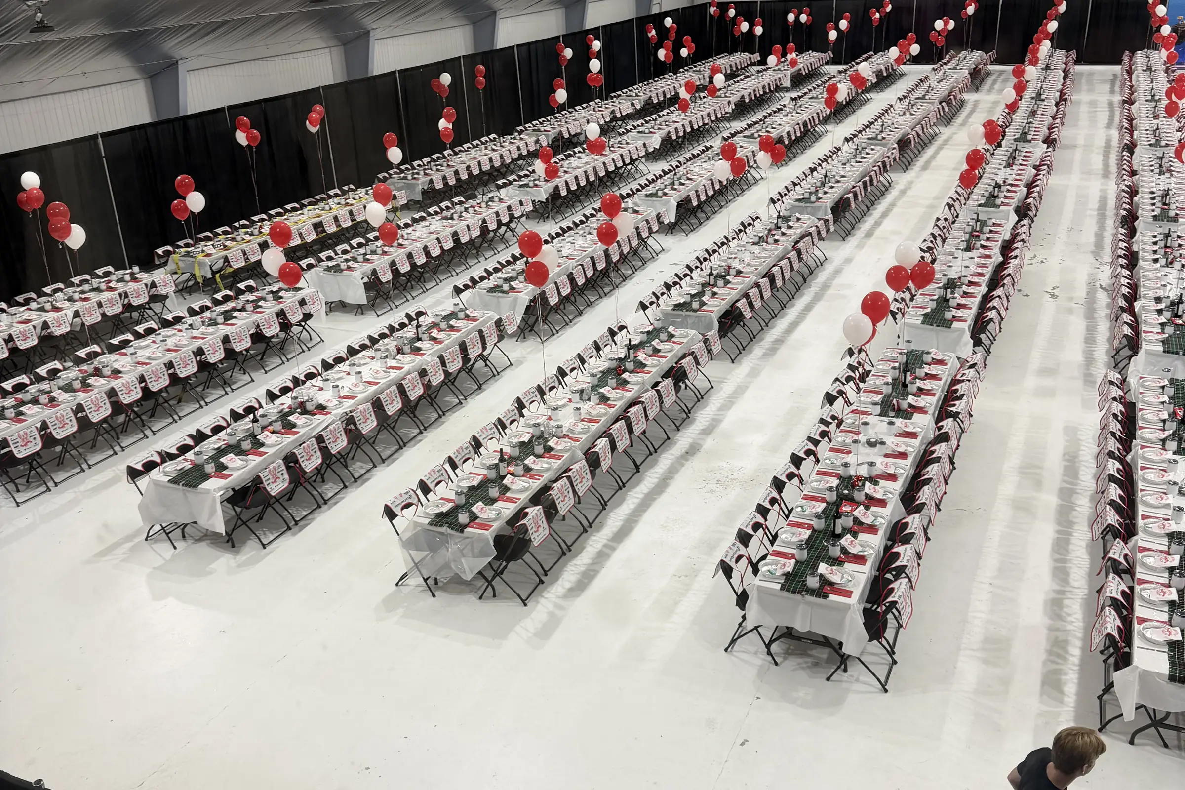 Banquet hall set with long dinner tables for hundreds of guests, catered by Fireside Catering in the St. John's area, Newfoundland
